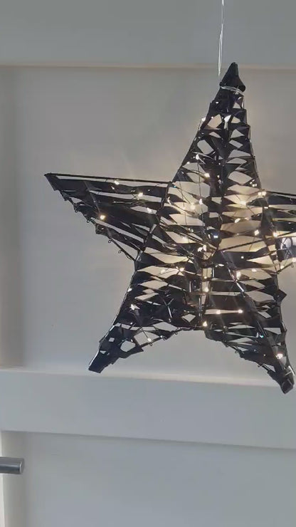 Zwarte kerstkrans en ster met LED verlichting